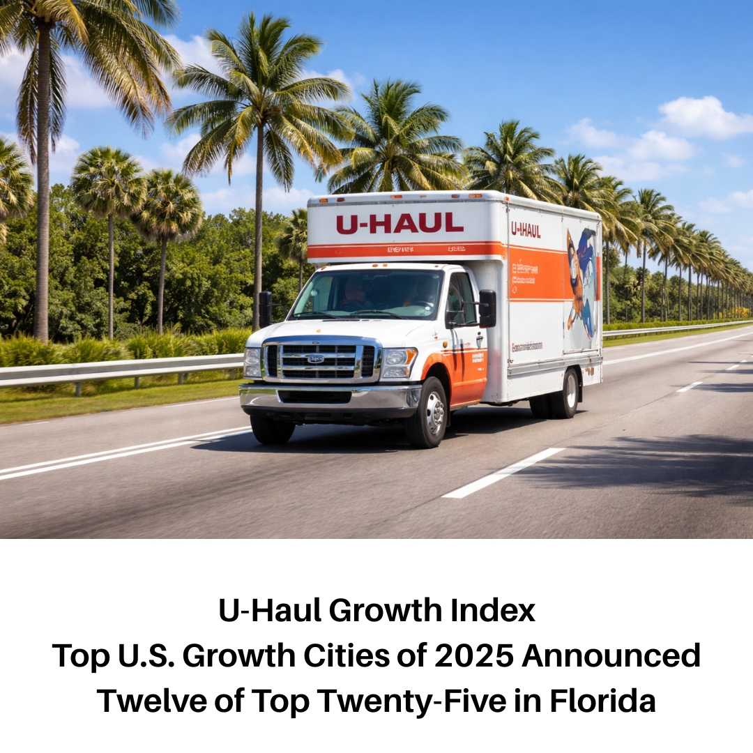 A picture of a U-Haul truck driving on a highway to Florida.